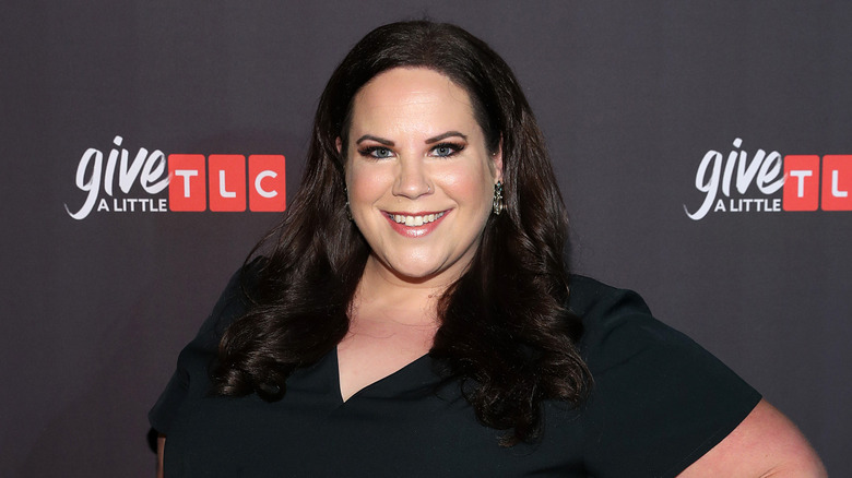 Whitney Way Thore posing for photos