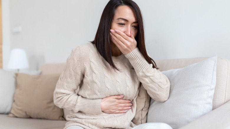 Woman experiencing morning sickness 