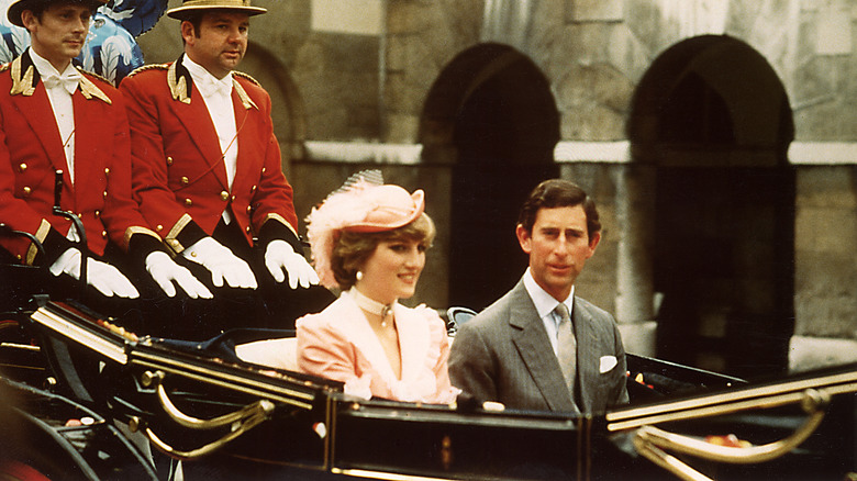 Princess Diana and Prince Charles being driven