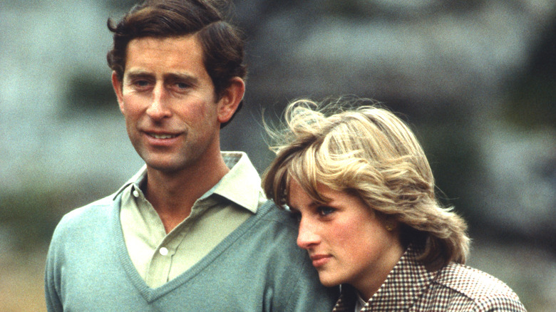 Princess Diana and Prince Charles embracing