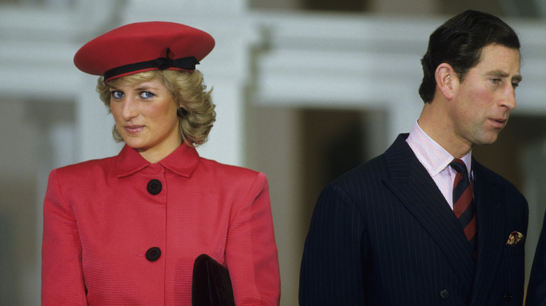Princess Diana and Prince Charles standing