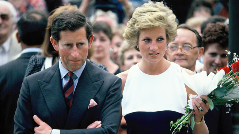 Princess Diana and Prince Charles walking together