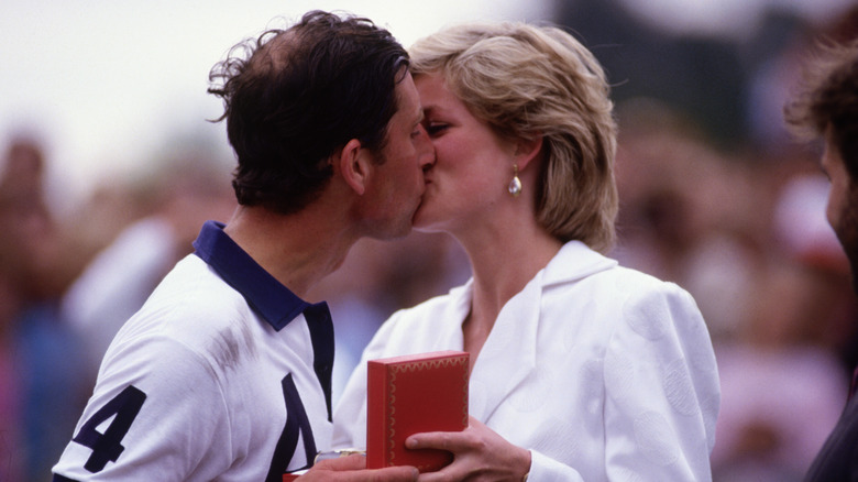 Princess Diana and Prince Charles kissing
