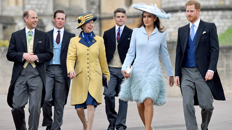 Members of the royal family walking outside