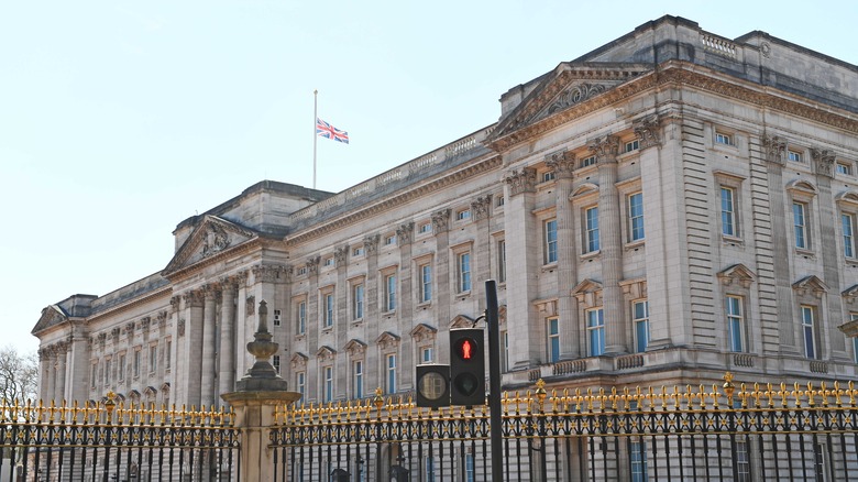Union Jack flag flying at Buckingham Palace
