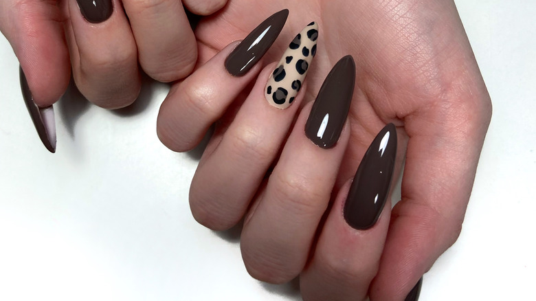 Woman with animal print nails 