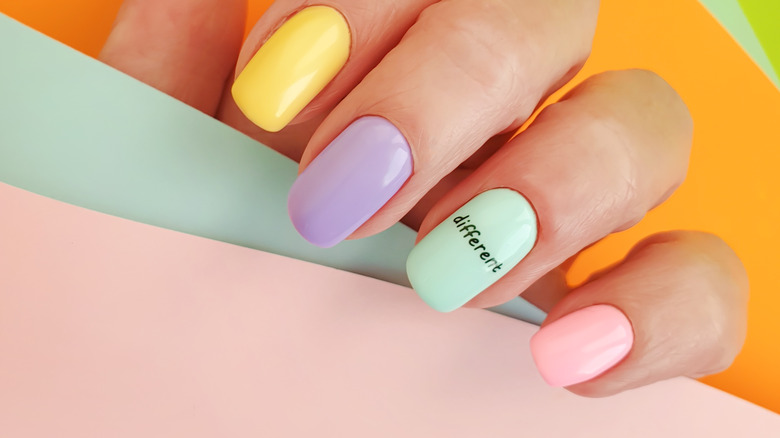 Hand with pastel nails