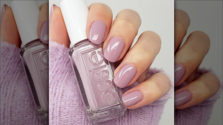 Woman with lavender nail polish