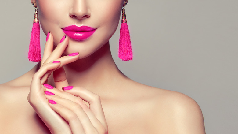 pink earrings lips and nails