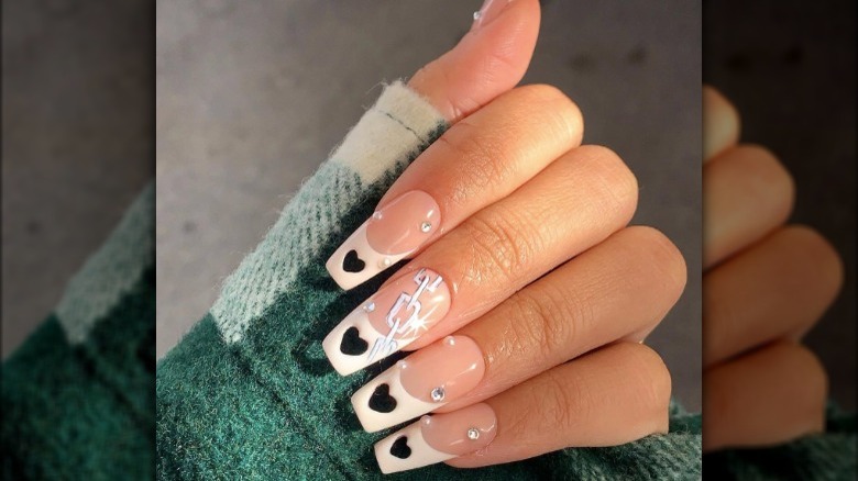 heart punched nails