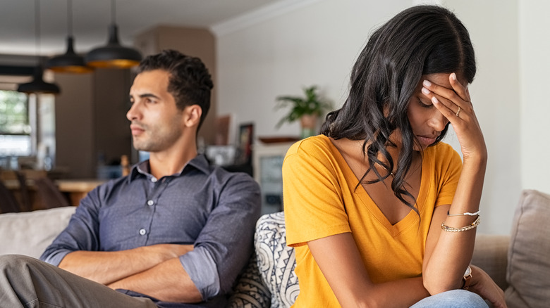 Couple looking defeated