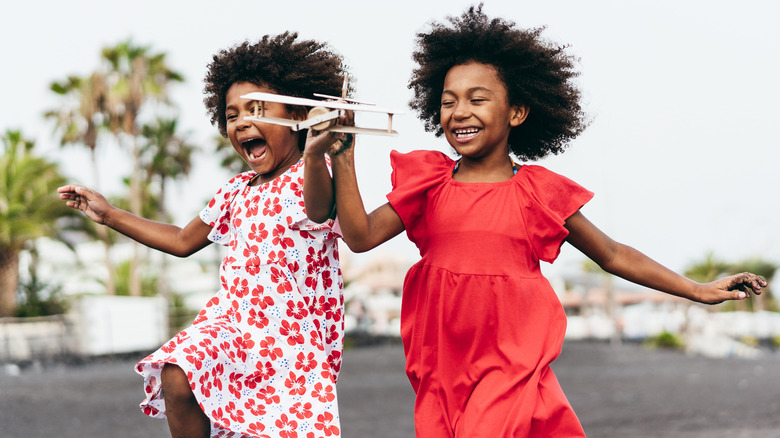 twin girls running