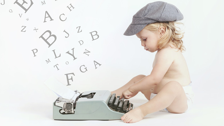 baby on a typewriter