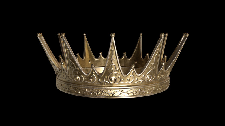 A golden crown on a black background 