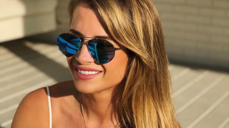 Naomie Olindo wearing sunglasses