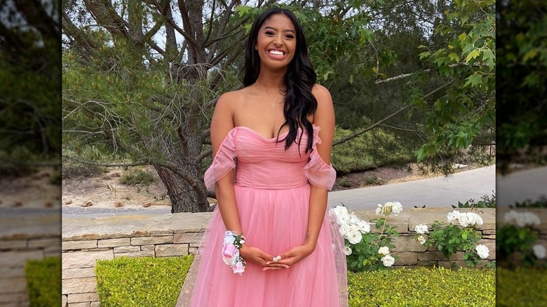 Natalia Bryant smiling in her prom dress