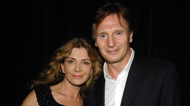 Natasha Richardson and Liam Neeson smile for the camera