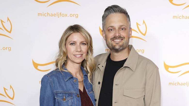 Laura and Nate Bargatze smiling