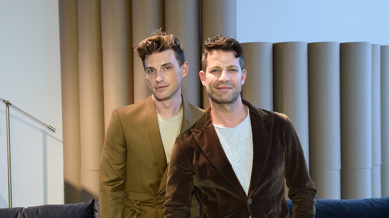 Nate Berkus and Jeremiah Brent by a stage