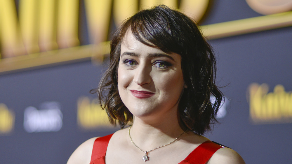 Mara Wilson wearing a red dress