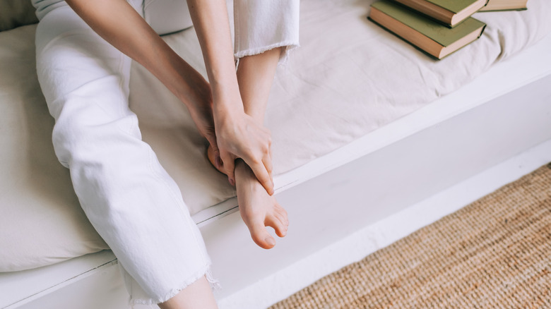 woman giving herself a massage