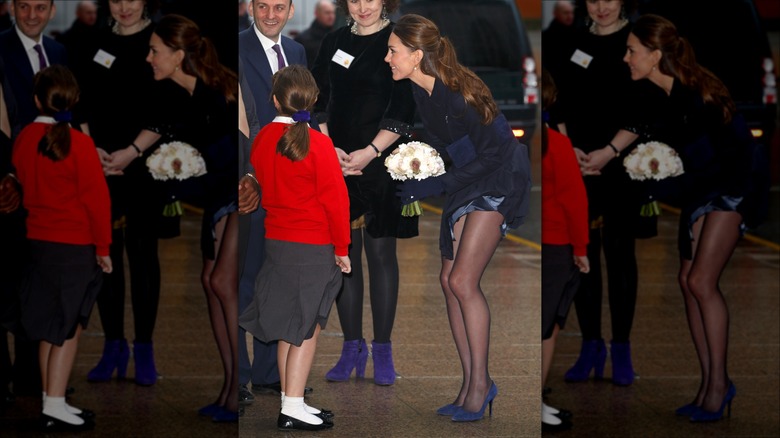 Kate Middleton with skirt blowing up