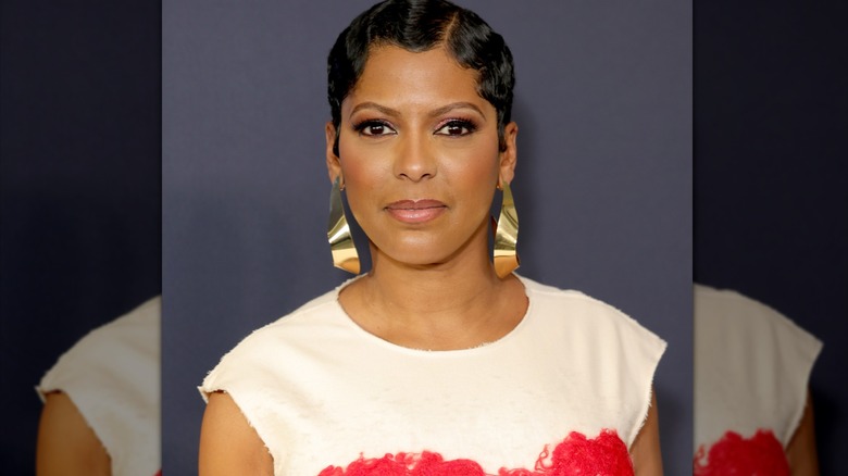 Tamron Hall unsmiling in white