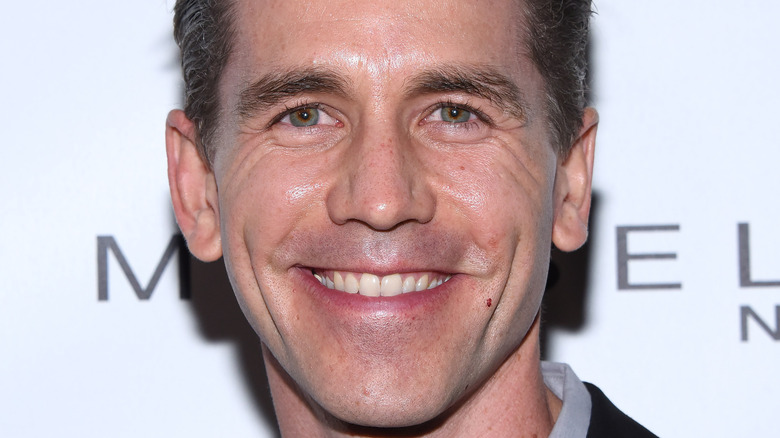 Brian Dietzen smiling at event