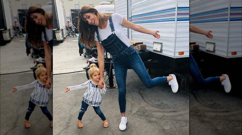 Daniela Ruah smiling with daughter Sierra