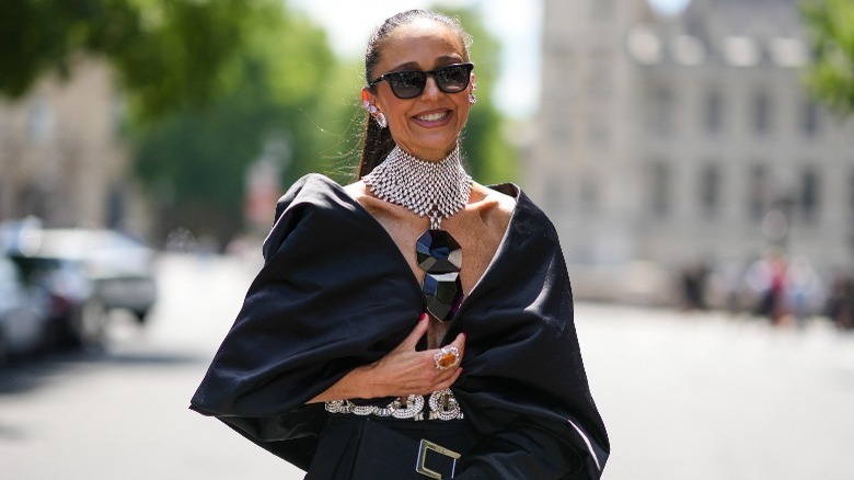 Woman wearing statement choker and V-neck