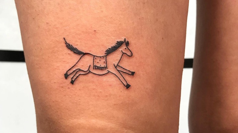 Horse tattooed in ignorant style