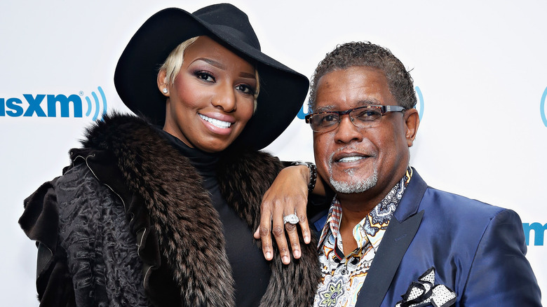 Nene Leakes poses with husband Gregg at an event