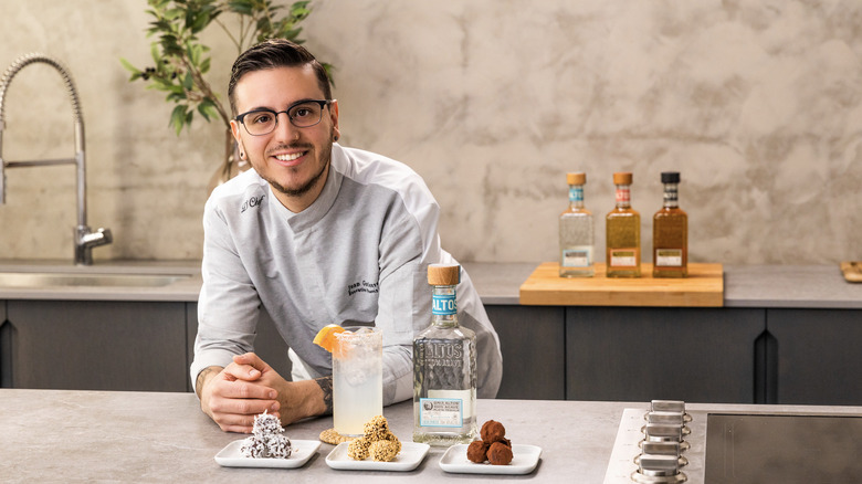 Juan Guiterrez displaying chocolate truffles