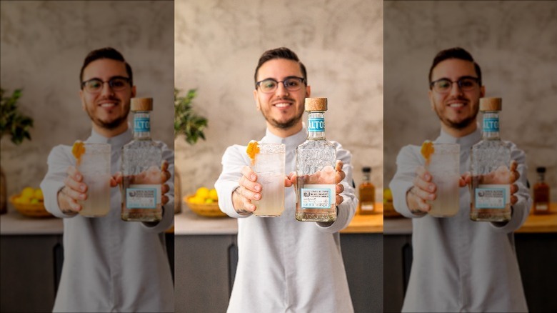 Juan Gutierrez posing with cocktail