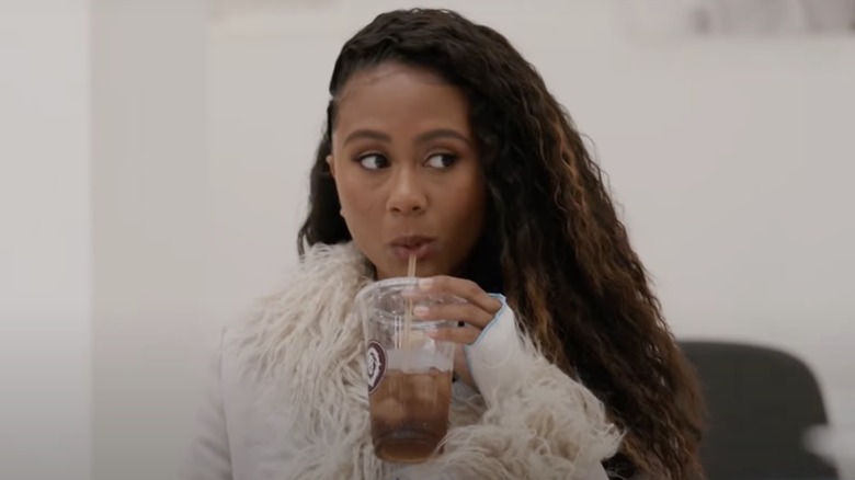 Netta Walker drinking a soda in All American: Homecoming