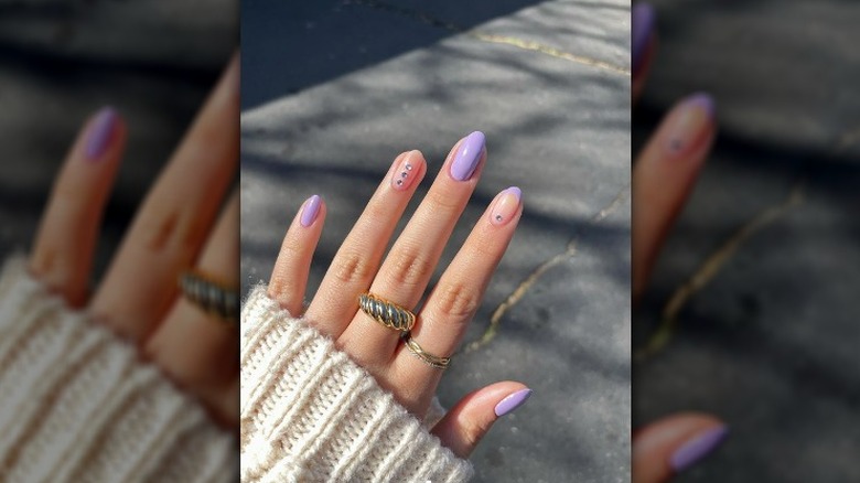 Lavender manicure with gemstones