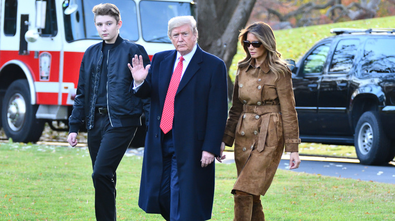 Barron Trump, Donald Trump and Melania Trump outside the White House