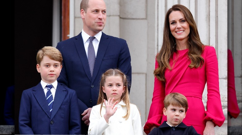 The Cambridges on balcony