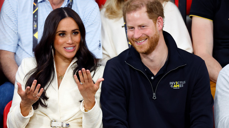 Meghan Markle and Prince Harry watching the Invictus Games