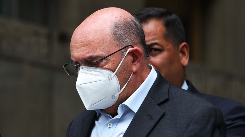 Allen Weisselberg in a mask on the day he was indicted