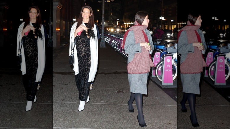 Katie Holmes walking alongside Suri Cruise