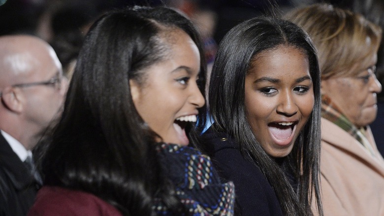 Malia and Sasha Obama smiling