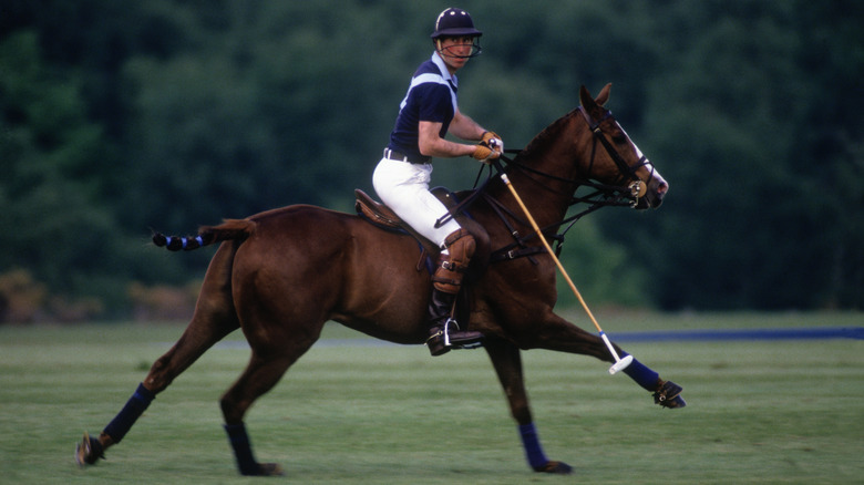 Prince Charles playing polo