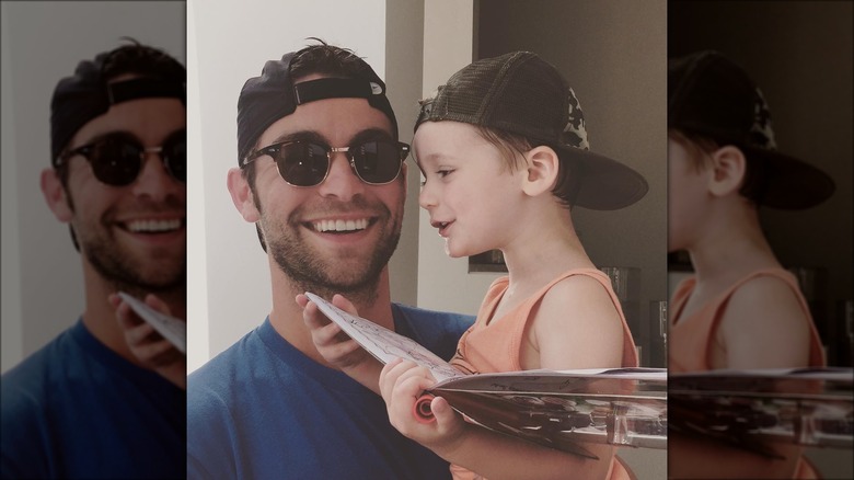 Chace Crawford holding his young nephew Hawk