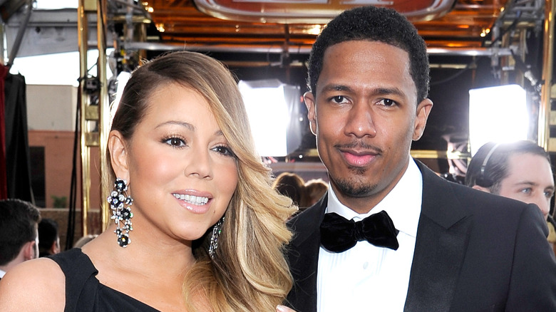 Mariah Carey and Nick Cannon posing