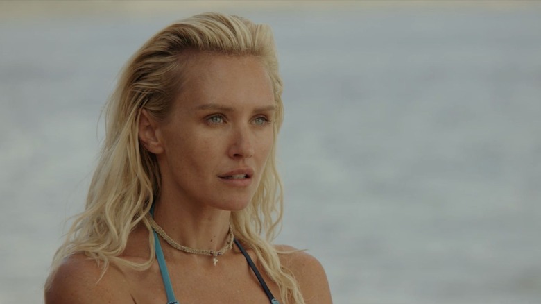 Nicky Whelan looking serious in Maneater