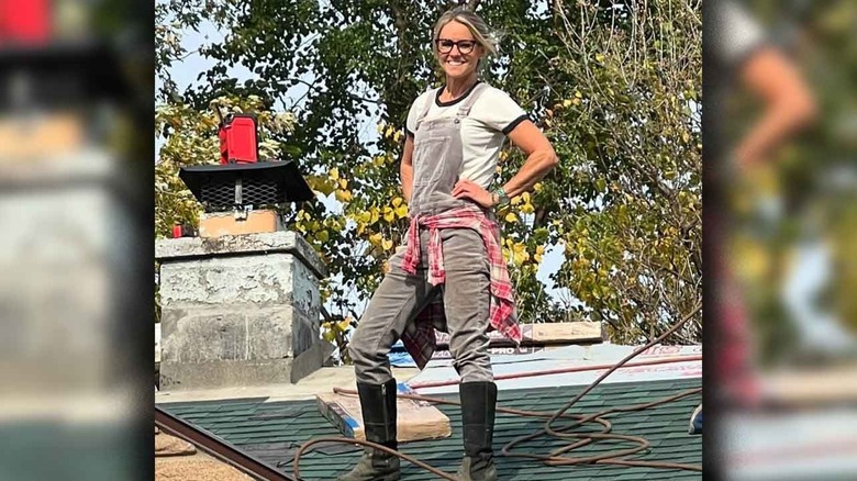 Nicole Curtis poses for a photo while walking on a roof in an Instagram pic