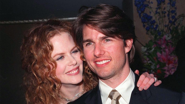 Nicole Kidman and Tom Cruise posing for photos