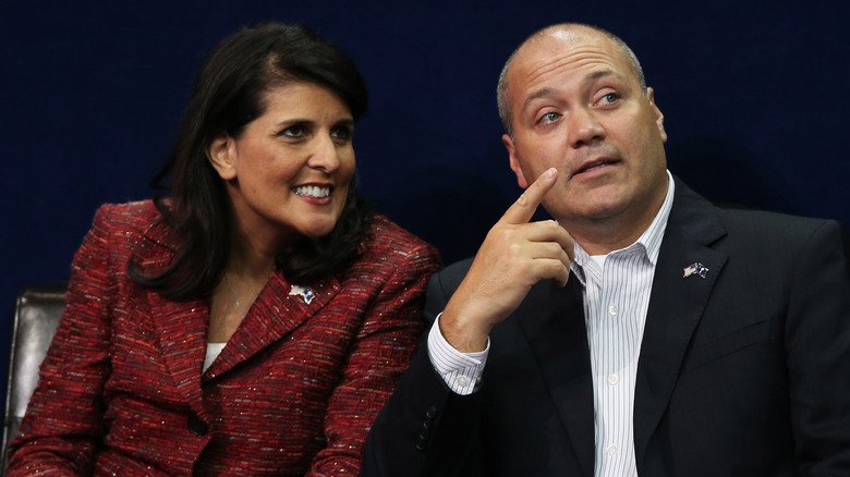 Nikki Haley looking as Michael Haley points