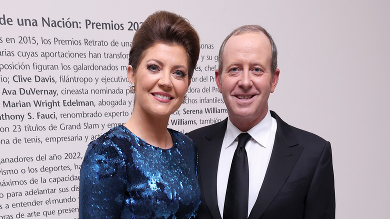 Norah O'Donnell and Geoff Tracy smiling